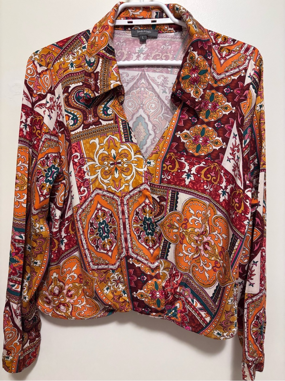 Haute Hippie Blouse size L long sleeves wrap style collar printed oranges